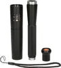 Disassembled parts of a black flashlight are laid out on a white background. Anteprima dell’immagine prodotto
