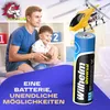 A father and son are playing with a remote-controlled helicopter, with a battery in the foreground. Produktbild-Vorschau