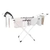 A white drying rack with laundry hanging on it, against a white background. Produktbild-Vorschau