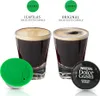 Two glasses of espresso coffee with coffee capsules in the foreground. Produktbild-Vorschau