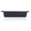 A side view of a black cast iron loaf pan with a white interior, set against a white background. Produktbild-Vorschau