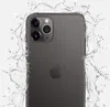 A dark gray iPhone 11 Pro Max is shown from the back, surrounded by splashing water. Podgląd zdjęcia produktu