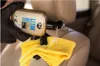 A gloved hand is pouring a cleaning product onto a yellow cloth, which is placed on a car seat. Podgląd zdjęcia produktu