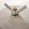 Close-up of a stainless steel lid with a pressure valve. Produktbild-Vorschau
