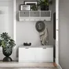 An entryway with a bench, shoe cabinet, shelf with storage bins, and decorative items. Anteprima dell’immagine prodotto