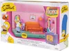 The Simpsons Living Room Diorama playset packaging, featuring Homer and Marge. Podgląd zdjęcia produktu