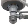 Close-up view of a sink drain and plumbing components. Podgląd zdjęcia produktu
