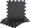 A stack of interlocking puzzle mats, with one mat placed upright. Podgląd zdjęcia produktu