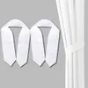 Two white graduation sashes are laid out on a gray background, with a white curtain on the right side of the image. Produktbild-Vorschau