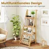 A wooden tiered shelf unit with plants and decorative items in a room. Anteprima dell’immagine prodotto