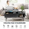 A woman is working on her laptop at a coffee table in a living room. A cat is also present. Voir les images du produit