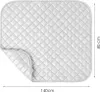 A quilted ironing mat is shown from a top-down perspective with dimensions indicated. Anteprima dell’immagine prodotto