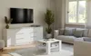 A modern living room with a white sideboard, a large television, a coffee table, and a sofa. Náhľad obrázku produktu