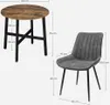 A round dining table with two chairs, with dimensions indicated by measurement lines and text. Produktbild-Vorschau