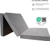 A folded gray mattress is shown, with text and logos on the right side. Náhled obrázku produktu