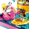 Two LEGO Friends characters are playing in a pool party setting. Produktbild-Vorschau