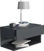 A modern, dark gray floating nightstand with an open shelf and a drawer. A table lamp and a small digital clock are on top, and books are in the shelf. Produktbild-Vorschau