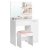 A white vanity table with a mirror and a pink stool against a white background. Produktbild-Vorschau