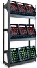 A three-tiered shelving unit holding crates of bottled drinks. Anteprima dell’immagine prodotto