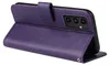 A purple flip case for a smartphone is shown from a side angle, with the phone inserted and the cover partially open. Produktbild-Vorschau