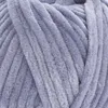 A close-up view of a ball of light blue and gray yarn. Produktbild-Vorschau