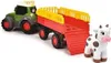 A toy tractor with a trailer and a toy cow. Produktbild-Vorschau