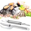 A collection of seafood including fish, mussels, shrimp, and snails, along with two fish scaling tools. Náhled obrázku produktu
