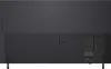 The back of a large, flat-screen television is shown, with its stand legs visible at the bottom. Produktbild-Vorschau