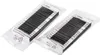 Two packaged black filter-like products. Voir les images du produit