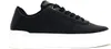 A black sneaker with a white platform sole is shown against a white background. Náhled obrázku produktu