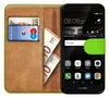 A book-style phone case with a Huawei P9 Lite phone inside, showing cards and cash in the case. Náhled obrázku produktu