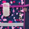 A close-up view of a backpack with a patterned fabric and attached accessories. Voir les images du produit
