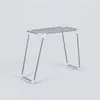 A product shot of a drying rack on a plain background. Produktbild-Vorschau