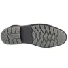 The sole of a black boot is shown against a white background. Voir les images du produit