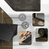 Collage of images showing a garage door seal and its features, including water and wind protection icons, installation, and a car driving over it. Produktbild-Vorschau