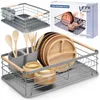 A collage of a dish drying rack with dishes, bowls, and cutlery, along with a product box. Produktbild-Vorschau