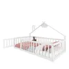 A white wooden children's bed with a house-shaped frame and a safety railing. Podgląd zdjęcia produktu