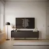 A modern living room with a TV stand and a large TV displaying a cast and crew list. Produktbild-Vorschau