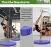 Pole dancers practicing in a studio and a stacked mat. Produktbild-Vorschau