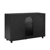 A black sideboard with arched doors and a fluted glass door in the center, shown against a white background. Voir les images du produit