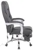 A side view of a black office chair with silver accents and a footrest. Voir les images du produit