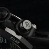 A close-up shot of a black Casio Edifice watch, focusing on the side buttons and part of the watch face. Voir les images du produit
