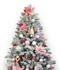 A decorated artificial Christmas tree with pink and silver ornaments. Náhľad obrázku produktu