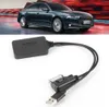 A car and an electronic accessory. Produktbild-Vorschau