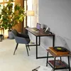 A home office setup with a desk, chair, plant, and record player. Voir les images du produit
