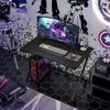 A gaming setup with a desk, computer, monitor, and chair in a room with themed wallpaper. Produktbild-Vorschau