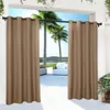 Outdoor curtains hanging on a balcony overlooking palm trees and a patio. Náhled obrázku produktu