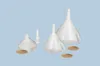 Three white plastic funnels of different sizes are arranged on a light blue background, with three circular filters in front of them. Anteprima dell’immagine prodotto