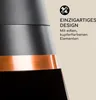 A close-up of a black outdoor fireplace with a copper band, featuring marketing text and an icon. Produktbild-Vorschau