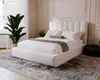 A bedroom scene with a white bed, large plant, and decorative wall. Náhled obrázku produktu
